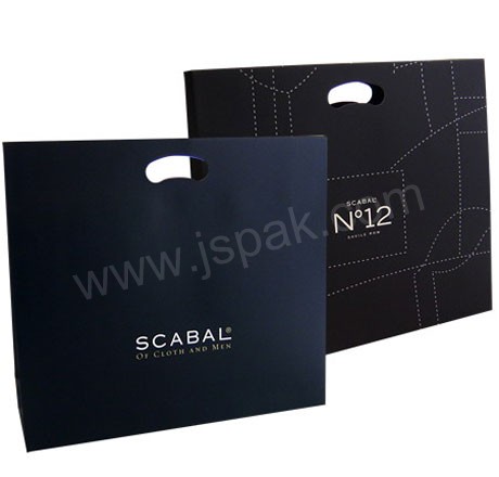 Pouched handle paper bag